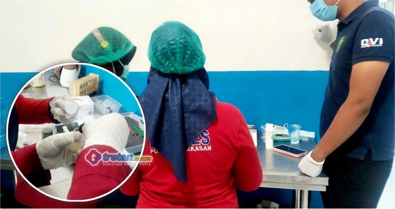 Petugas Si Dokkes Polres Pamekasan memeriksa keamanan makanan program pemenuhan gizi