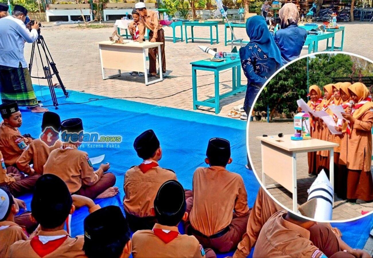 Siswa MTs Kyai Mudrikah memamerkan karya IPA dari barang bekas di Pamekasan