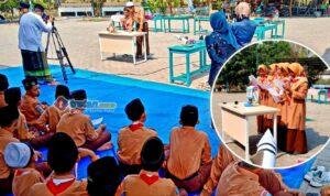 Siswa MTs Kyai Mudrikah memamerkan karya IPA dari barang bekas di Pamekasan