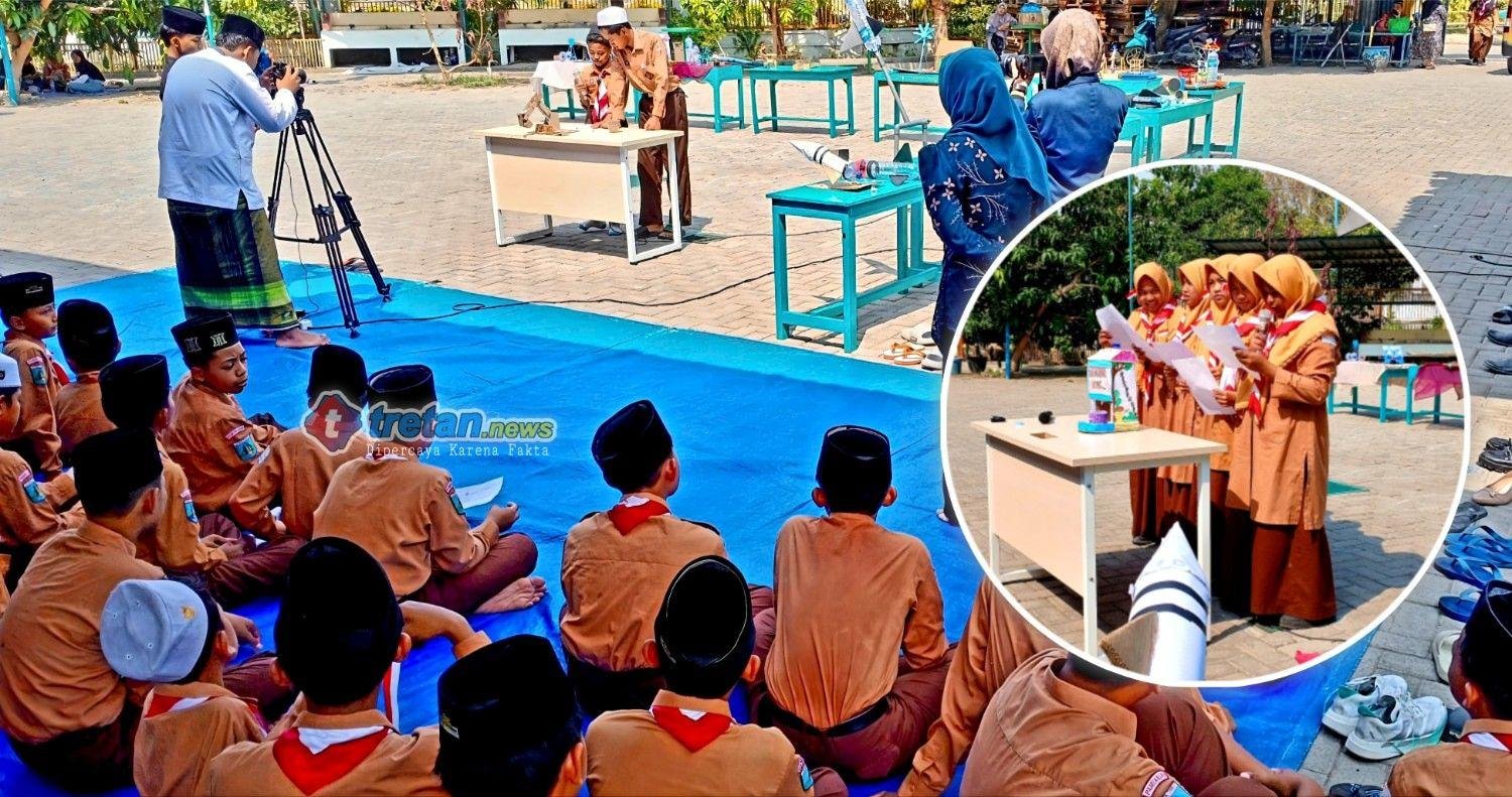 Siswa MTs Kyai Mudrikah memamerkan karya IPA dari barang bekas di Pamekasan